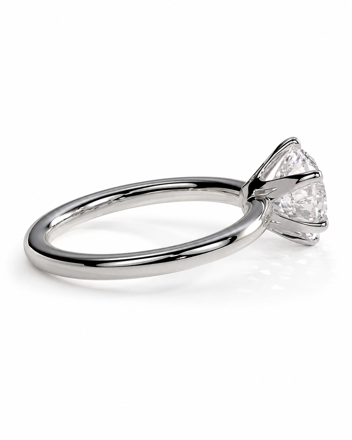 color_925_SIL,color_935_ARG,color_10K_WG, color_14K_WG &&A rose gold solitaire ring featuring a marquise-cut clear gemstone in a four-prong setting, shown on a clean white background.