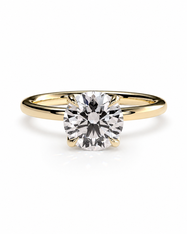 color_10K_YG, color_14K_YG &&A classic solitaire engagement ring featuring a round brilliant-cut diamond set in a yellow gold four-prong band, shown on a clean white background.